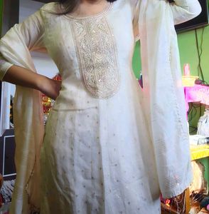 Elegant White Kurta Set with Embellished Neckline