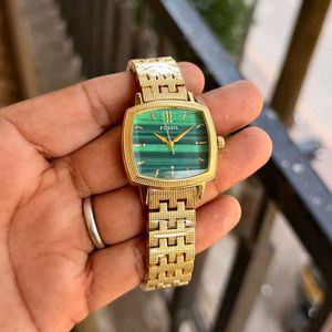 Gold Fossil Watch with Green Dial