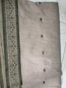 Elegant Beige Saree with Green Border