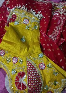 Embroidered red saree and ready blouse