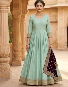 Elegant Pastel Gown with Embellished Border