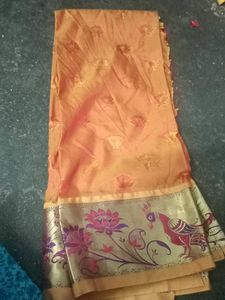 Orange blouse material with Peacock Border
