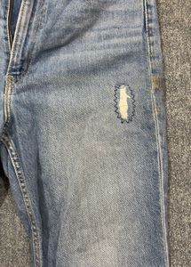 Distressed Blue Denim Jeans