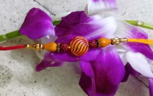 7 Assorted Rakhi Bracelets with Ornate Designs
