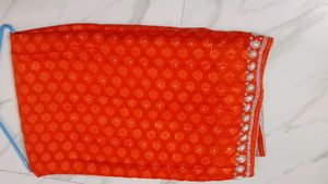 Orange Pearl Embroidery Saree.