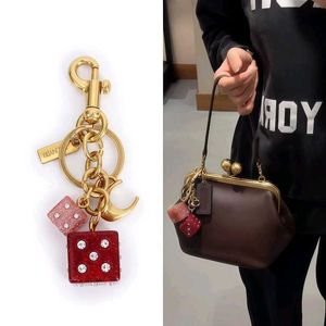 COACH DICE CLUSTER BAG CHARM WITH BOX