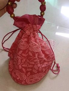 Embroidered potli  with Beaded Handle