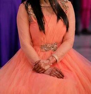 Stunning Orange Net Gown with Embellished Belt