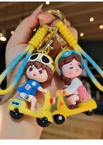 YELLOW SCOOTY GIRL KEYCHAIN