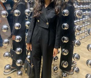Chic Black Jumpsuit with Blazer Style Top