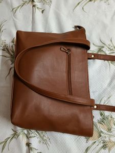 "Carry your essentials in style with this Handbag"