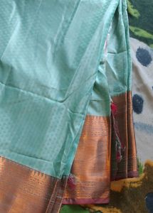 Elegant Turquoise Saree with Gold Border