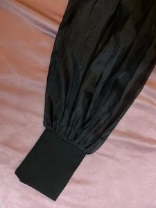 Chic Black Top with Sheer Sleeves