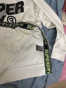 white superdry sweatshirt