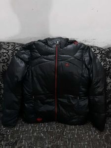 Black Puffer Jacket with Red Accents