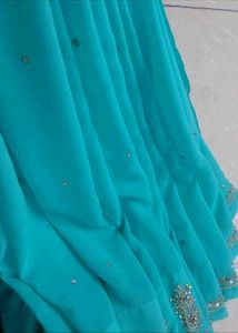 Turquoise Embroidered Saree
