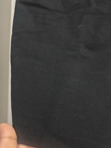 Chic Black Ruffle Skirt with a Slit