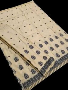 Elegant Cream Saree with Black Motifs