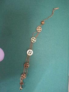 Elegant Gold Bracelet with Charm