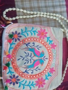 Embroidered Clutch with Tassels