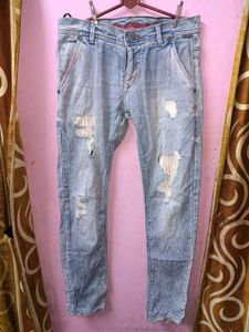 Distressed Light Wash Denim Jeans