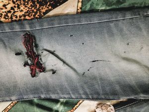 Distressed Blue Denim Jeans