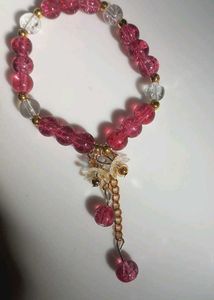 pink Beaded Bracelet with acrylic floral hanging