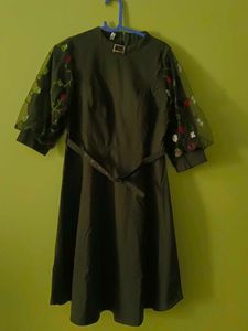 Elegant Dark Green Dress with Floral Sleeves