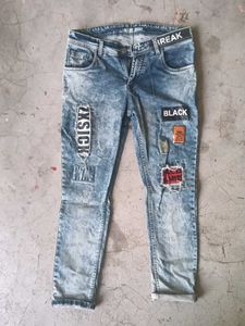 Distressed Patch Jeans
