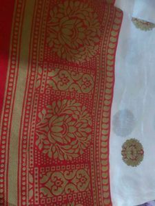 Elegant White Saree with Red Border