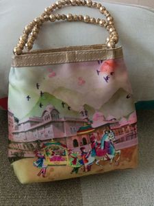 Unique Beaded Handle Clutch Bag