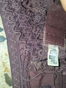 Lace Trimmed Pink Bra and Brown