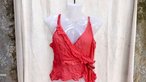 I. Chic Coral Wrap Top