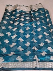 Elegant Teal Saree with Silver Border
