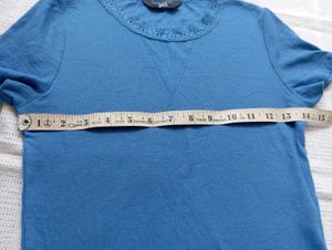 Blue Ribbed Lettuce Hem Top