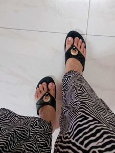 Stylish Black Thong Sandals with Gold Accent