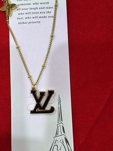 Gold Tone Letter Pendant Necklace