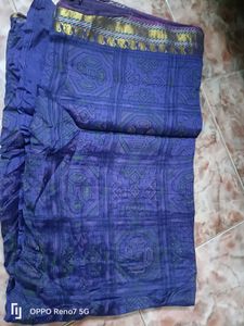 Vibrant Blue Saree with Intricate Pattern