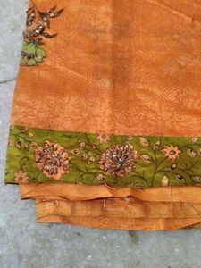 Elegant Orange Saree with Floral Print