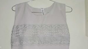 Elegant tunic with jacket and belt