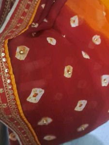 used Beautiful Maroon  orange Bandhani Saree