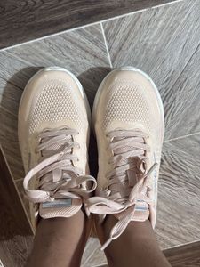peach color sneakers