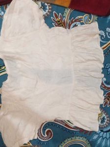 Embroidered peach Peplum top