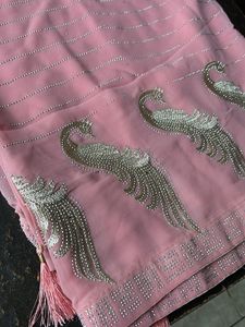 Elegant Pink Saree with Peacock Motif