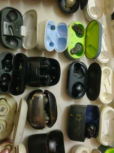 Assorted Earbud Cases and Earbuds