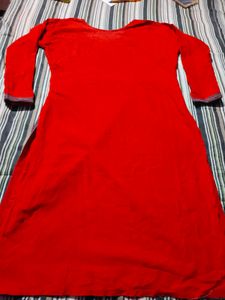 Vibrant Red Kurta with Intricate Neckline