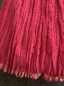 Vibrant Pink lehenga with Gold Accents