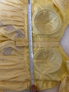 Yellow Embroidered Peplum Blouse