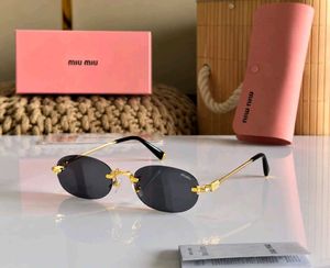 Miu Mi Oval Rimless Sunglasses