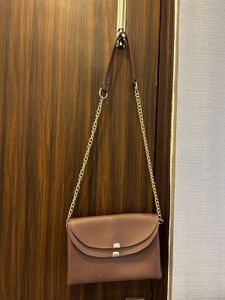 Chic Mauve Crossbody Bag with Gold Chain